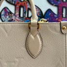 Louis Vuitton OnTheGo PM Empreinte M46569
