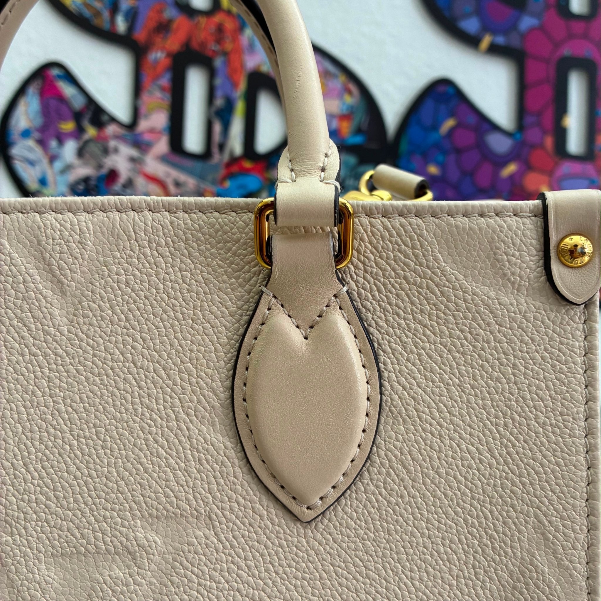 Louis Vuitton OnTheGo PM Empreinte M46569