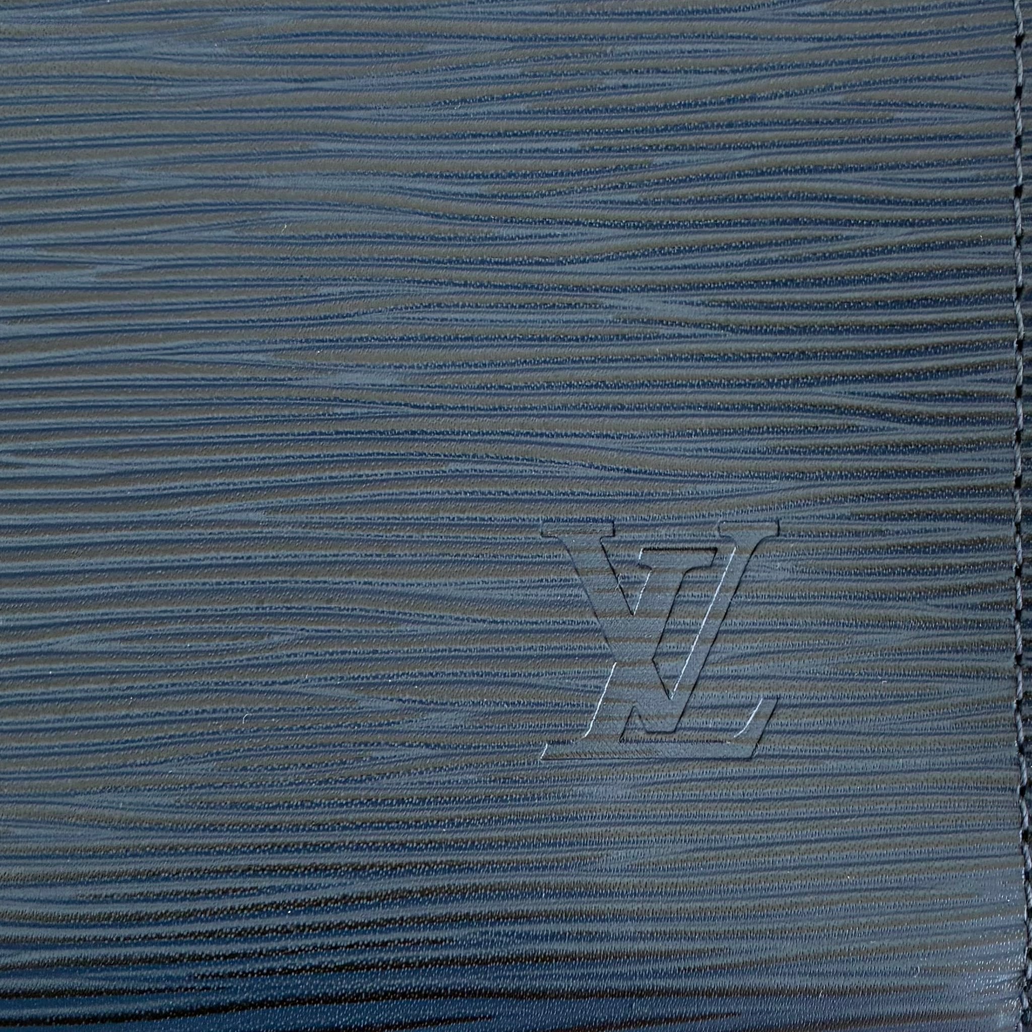 Louis Vuitton Pochette Voyage MM Epi