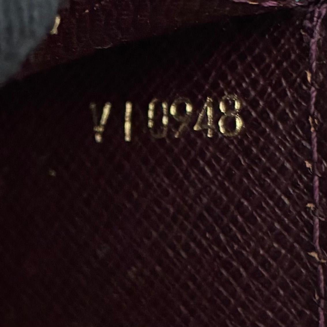 Louis Vuitton Serviette Kourad Taiga