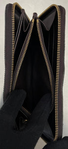 Louis Vuitton Zippy Lackleder