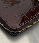 Louis Vuitton Zippy Lackleder