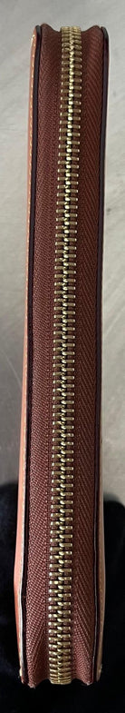 Louis Vuitton Zippy Nomade