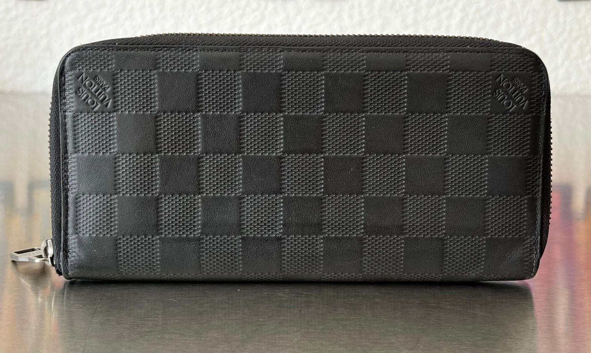 Louis Vuitton Zippy Vertical Infini Leder