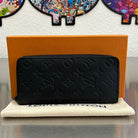 Louis Vuitton Zippy Vertical Monogam Shadow