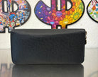 Louis Vuitton Zippy Vertical Taiga mit Initialen R.T